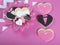 Pink, black and white wedding hearts shape cookies