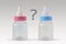 Pink and blue baby bottles with question mark - Male or female? Concept of future baby gender