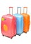 Pink blue orange luggage isolated