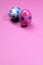 Pink and blue polka dot Easter eggs - vertical with copy space