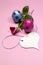 Pink and blue polka dot Easter eggs with white heart gift tag - vertical with rose.