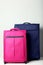 Pink and blue suitcases