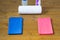 Pink and blue things for fitness on the wooden floor