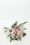 Pink Bridal Bouquet of Roses, Alstroemeria, Chrysanthemum and Eustoma Isolated on White Background. Vertical Image with Copy Space