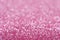 Pink bright glitter bokeh background.