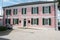 Pink building of House of Assembly in Colonial architect style in Parliament Square in downtown Nassau, Bahamas.