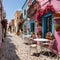 Pink buildings create a vibrant Mediterranean atmosphere