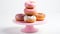 Pink Cake Stand With Stacked Donuts - Creative Commons Attribution