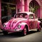 A pink car parked on the street