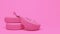 Pink car wheel and pink women`s shoe on a pink background. Creative conceptual illustration in a glamorous girlish style. Copy