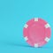 Pink casino chip on bright blue background in pastel colors