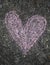 Pink chalk heart of sidewalk