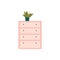Pink chest of drawers and green house plant in blue pot