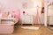 Pink child bedroom with lamp