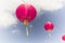 Pink Chinese Paper Lanterns against a Blue Sky