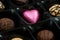 Pink chocolate heart in box