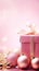 Pink Christmas background with festive Christmas balls and gift boxes. Vertical reels backgrounds, story, xmas poster