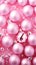 Pink Christmas background with festive Christmas balls. Vertical reels backgrounds, story, xmas poster, web banner