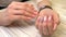 With pink Close Up View, slow motion Female hands manicure close up view. Delicate spring manicure.