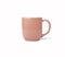 Pink Coffee cup made of glazed porcelain on isolated white