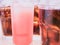 Pink color from cool fruit juice with soft focus sparkling water