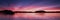 Pink colored cirrostratus cloud, sunset seascape.