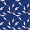 Pink colored shark ornament seamless doodle pattern in random style. Navy blue background. Cute print