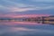 Pink colors of dawn over the Trinity bridge and the Palace embankment