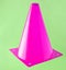 Pink cone, road barrier isolated on a blue background.
