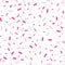 Pink confetti sprinkles seamless pattern.