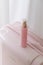 Pink cosmetic bottle beauty product still life