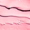 Pink cosmetic texture background, make-up and skincare cosmetics product, cream, lipstick, moisturizer macro as luxury beauty