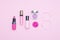 Pink cosmetics on a pink background. Minimalist design