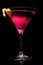 Pink cosmopolitan cocktail isolated on black