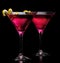 Pink cosmopolitan drinks isolated on black