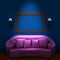 Pink couch with empty frame and sconces