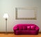 Pink couch with standard lamp