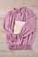 Pink cozy womens blouse with blank notepad.