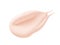 Pink cream swatch isolated on white. Cosmetic face skin care product smear. Beauty creme smudge