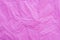 Pink creased paper tissue background texture