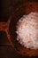 Pink Crystal Rock salt in rustic wooden spoons