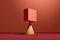 A pink cube block is balancing on a cone. Concept of balance, harmony or stability