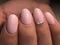 Pink cute girly nails with crystals macro