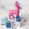 Pink deer and christmas decorations