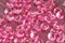 Pink diamonds on fabric texture