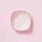Pink dish isolated on pink background
