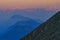 Pink Dolomites mountains illuminated by the first rays of morning sun