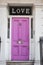 Pink door with letters `LOVE` found on a house in Chelsea, London