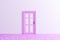 Pink door and white wall