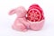 Pink Easter bunny eggshell with artistic painted Easter egg